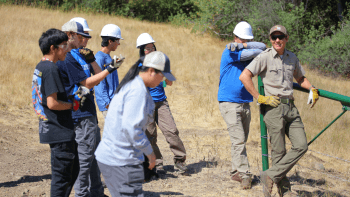 Student Conservation Association students gather to learn from David Mauk.