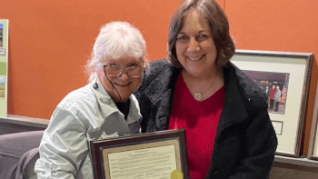 Garnetta receives a commendation from San Jose City Councilmember Pam Foley.