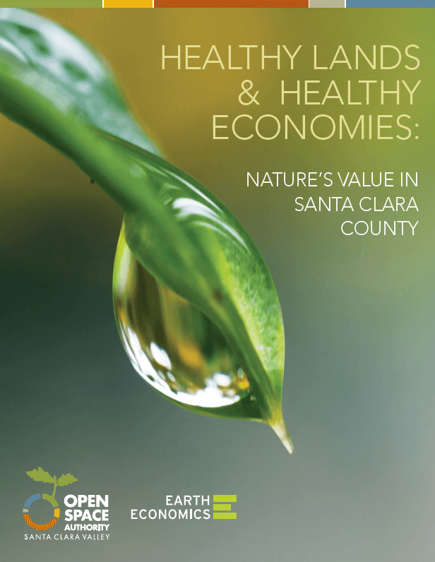 A report cover with fine text that reads "Healthy Lands & Healthy Economies: Nature's Value in Santa Clara County" next to a macro image of a drop of water on a green leaf